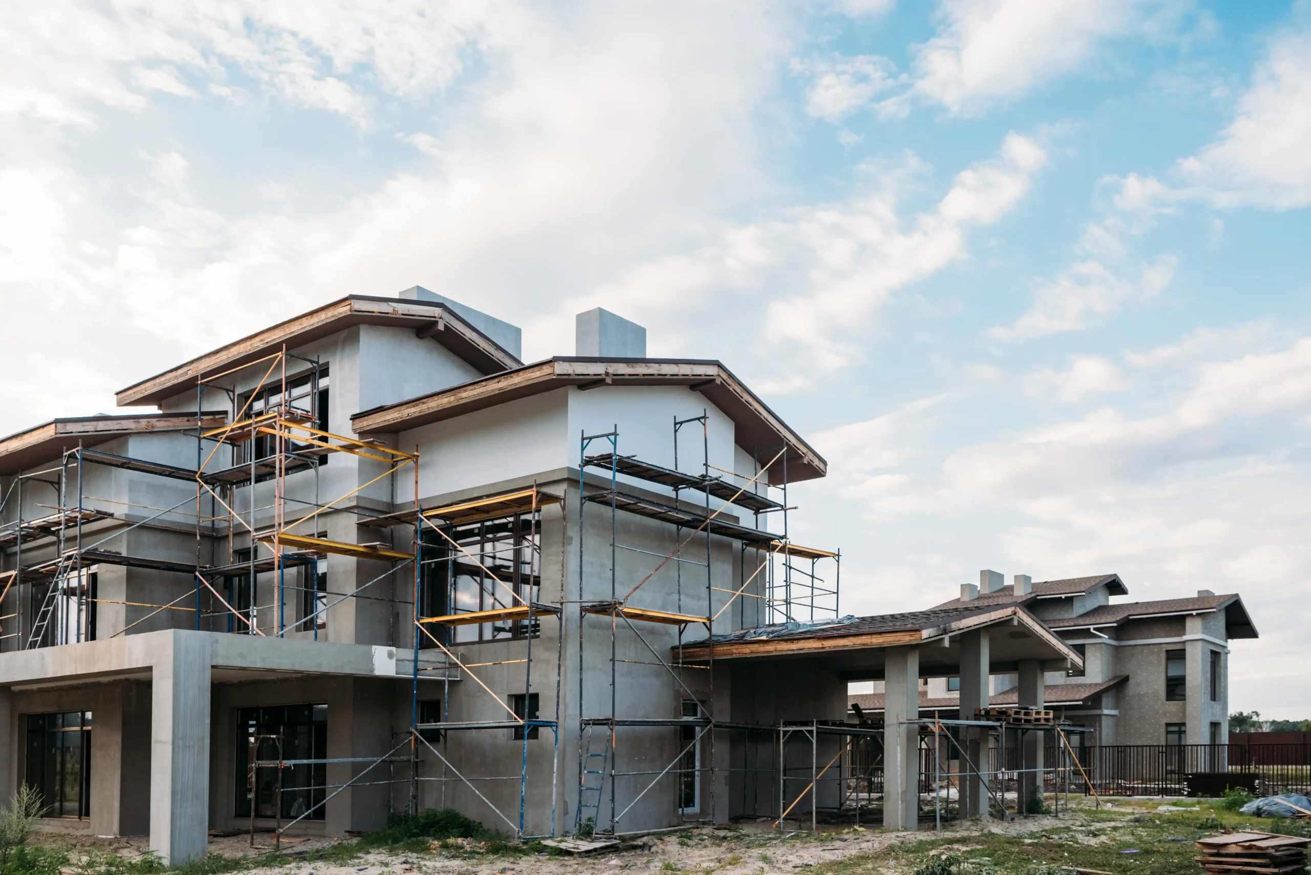 modern-building-construction-with-scaffolding-unde-2024-11-18-14-03-54-utc